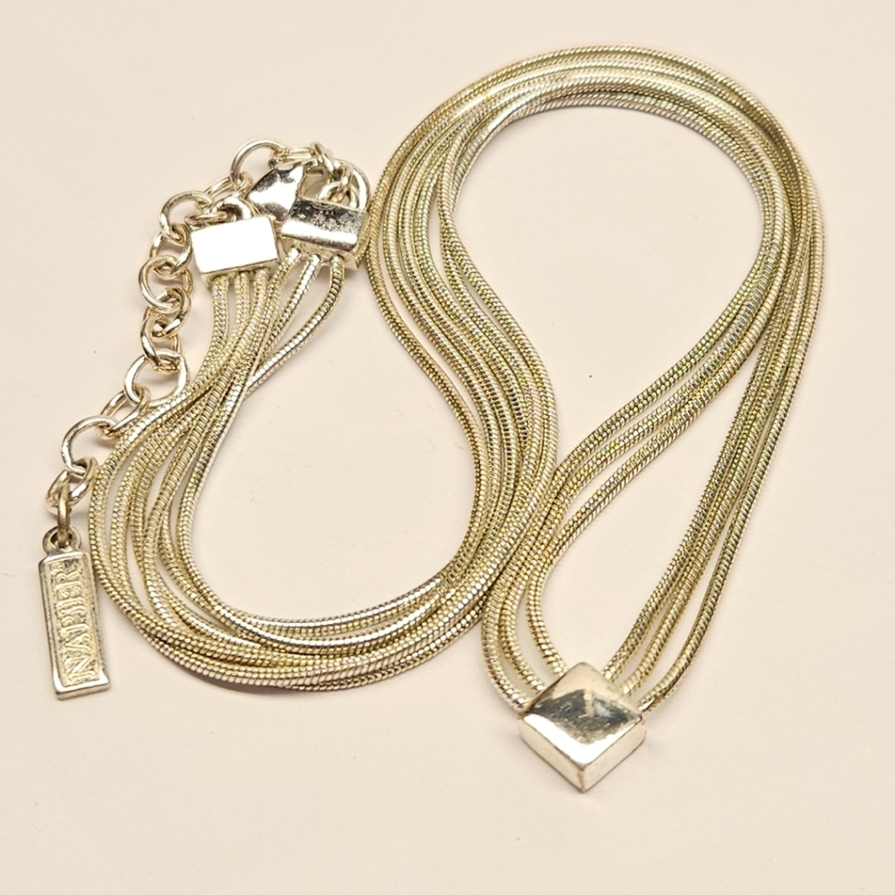 Napier Silver 3 Strand Necklace with Diamond Shaped Pendant.